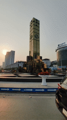 Golden clock tower fountain documented in Hong Gai Ward Vietnam