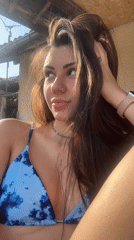 Woman poses outdoors, traditional meal photographed in Bulgarian village