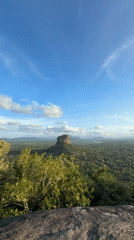 Tourist documents panoramic views of Sigiriya rock fortress, Sri Lanka