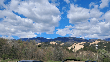 Mountain landscape recorded with vehicles near Rozhen, Bulgaria