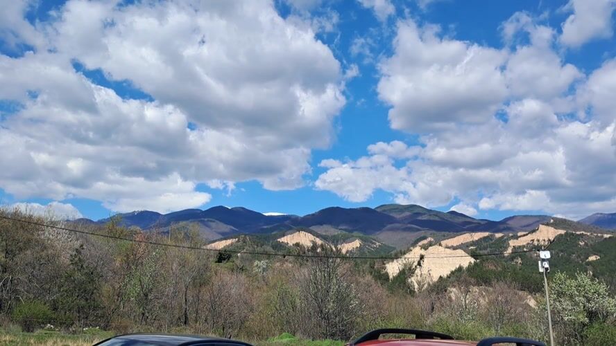 Mountain landscape recorded with vehicles near Rozhen, Bulgaria
