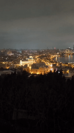 Nighttime cityscape of Baku captured from elevated viewpoint