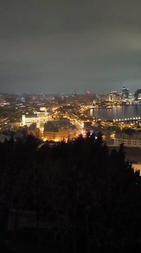Nighttime cityscape of Baku captured from elevated viewpoint