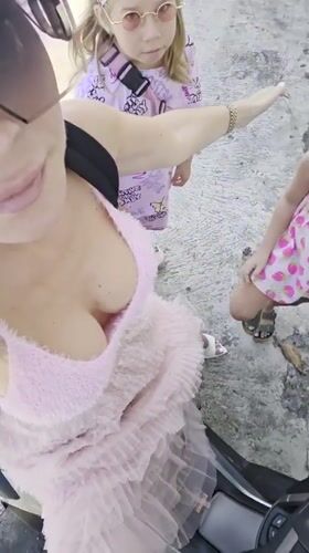 Matching pink outfits and a Yamaha NMAX in North Kuta