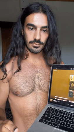 Man displays Lana Del Rey album on laptop in Indonesia