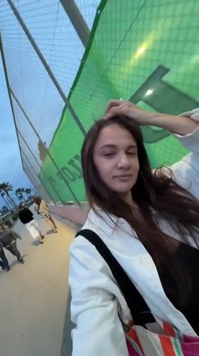 Woman films herself walking in Glifada coastal area