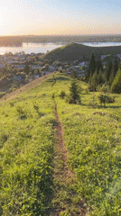 Hilltop sunset walk captured overlooking Ольховка village, Russia