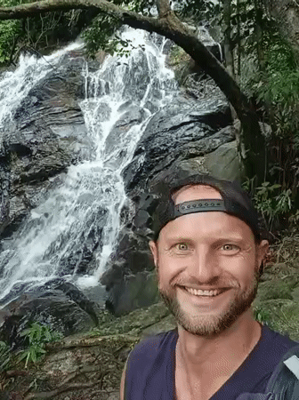 Waterfall hike with stone carvings and millipede encounters