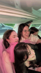 Young women sing Russian pop songs in luxury vehicle