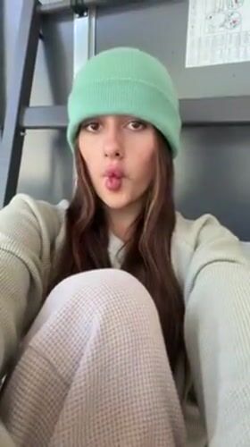 Woman takes morning selfies in Tel Aviv apartment