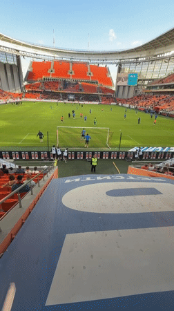 Soccer event with fans, players at Yekaterinburg stadium