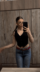 Woman Takes Mirror Selfies in Yerevan Home