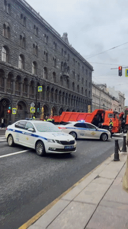Police stop dump trucks during public event in Saint Petersburg