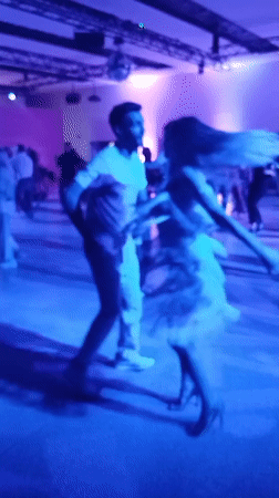 Dancing under purple lights in Wrocław on a Friday night