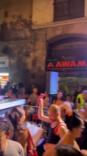 Barcelona street festival: live music, fire juggling, and football