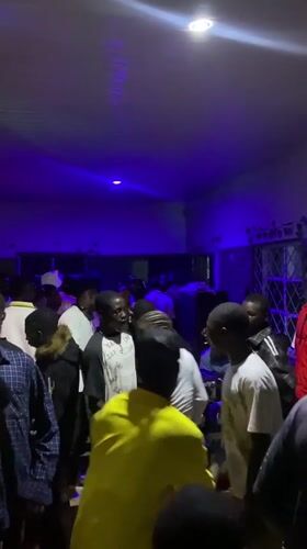 Evening social gatherings and chess games documented across Nigerian towns
