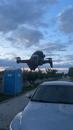 Man pilots drone with VR headset in Plovdiv residential area