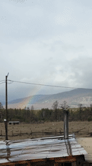 Rainbow spotted over rural Tyulyuk, Russia countryside