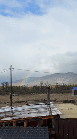Rainbow spotted over rural Tyulyuk, Russia countryside