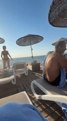Chilling on a beach club deck in Kuşadası, Turkey