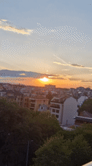 Dramatic sunset creates orange sky over Plovdiv, Bulgaria