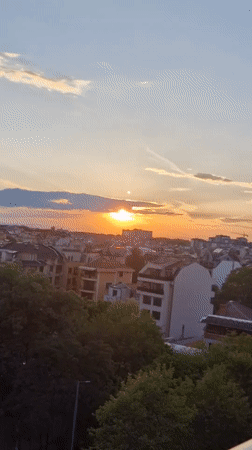 Dramatic sunset creates orange sky over Plovdiv, Bulgaria