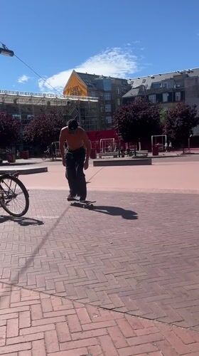 Skate session at a Copenhagen plaza with street art