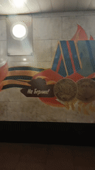 Moscow Metro Station Documented with Soviet Artwork and Escalators