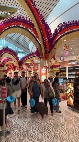 Traditional Balinese Barong masks displayed at Kuta airport terminal