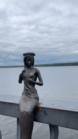 Casual waterfront moments documented in Chaikovsky, Russia
