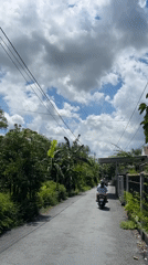 Scooter ride through An Hữu village streets