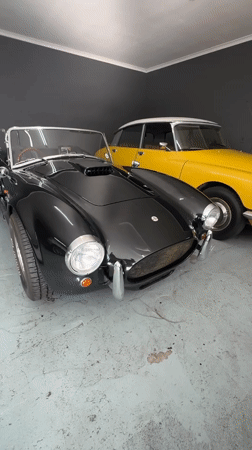 Classic car collection documented at Cape Town automotive facility