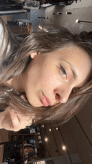 Domestic moments captured in Krasnoyarsk: woman's selfies, sleeping dog