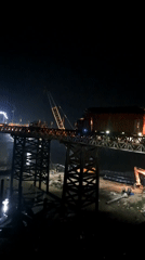 Nighttime bridge construction documented in Blang Mee, Indonesia