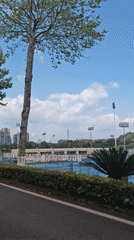 Morning view of tennis court and buildings in Chongqing
