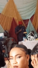 Formal celebration with dining, dancing, traditional attire documented