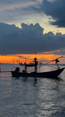 Sunset beach gathering at Baan Thong Po, Thailand