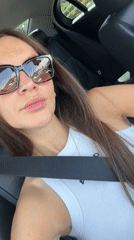 Passenger at ease on a summer drive along the Montenegrin coast