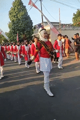 Street parade blends marching band and traditional costume performance