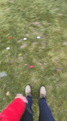 Golfer practices putting with colorful balls in Coquitlam