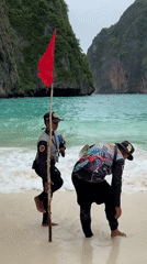 Early morning beach gathering recorded at Ao Nang, Thailand