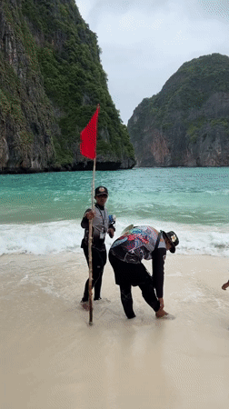 Early morning beach gathering recorded at Ao Nang, Thailand