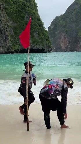 Early morning beach gathering recorded at Ao Nang, Thailand