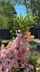 Event setup underway with floral arrangements in Юг, Russia