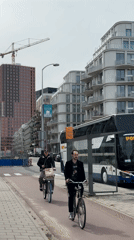 Morning urban documentation captures Amsterdam street life and architecture