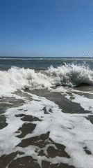 Calm afternoon surf along the Costa del Sol coast