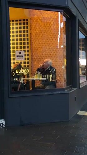 Elderly man dines alone at Ushuaia restaurant