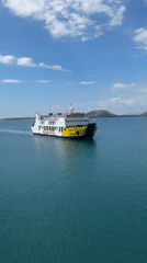 Ferry crossing calm Indonesian waters near Lombok's coast