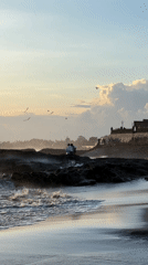 Sunset beach crowds gather at Canggu despite swimming warnings