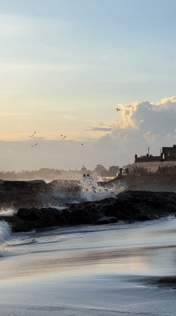 Sunset beach crowds gather at Canggu despite swimming warnings